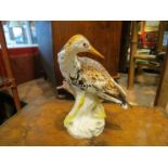 A Meissen marked porcelain figure of "Wading Bird", base marked 3210, 77186,