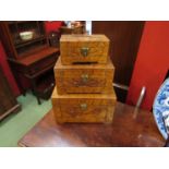 A graduated set of three Oriental camphor wood chests,