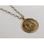 A 9ct gold St Christopher pendant with 9ct gold loop chain