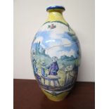 A French vase depicting farm workers drinking, 51cm tall,