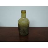 A 19th Century local interest bottle stating "This is the property of Gostling & Co Diss (interior