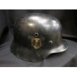 A German M40 helmet bearing SS decal and inscription to helmet liner "Franz V. 1942 Hubenkarl LAH".