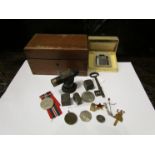A mahogany box of miscellaneous including WWII war medal, Zeiss scope eyepiece,