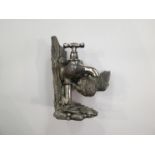 A white metal Country Artists novelty figure of a bird drinking water from a tap marked S & J W.