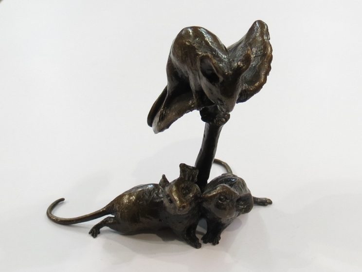 A bronze mushroom with three mice, 7.
