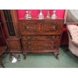 Attributed to "Maple & Co" a figured walnut caddy top,