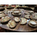 Royal Crown Derby "Old Imari" pattern dinner wares with floral pattern including chargers, bowls,