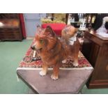 A large China figure of a Corgi indistinctly marked under foot Italy