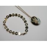 A silver Niello Eastern pendant and silver bracelet