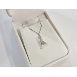 An 18ct white gold pendant set with single .