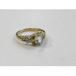 A 9ct gold hallmarked diamond and blue topaz ring