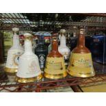 Six various Bell's Wade whisky bells