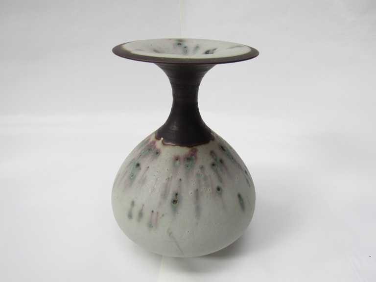 GRAEME JAMES (b.1942 Australian) A studio pottery vase with flared rim, incised 'James' to base. 22.