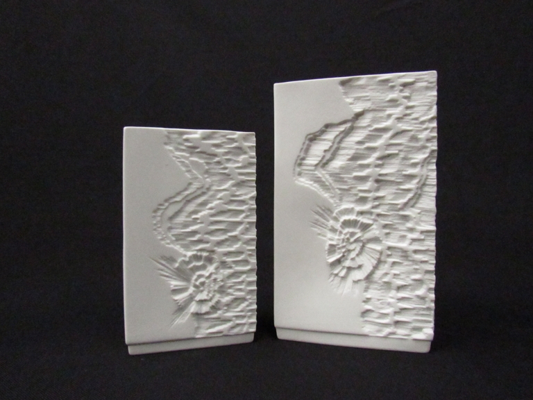 Two early 1970's AK Kaiser 'back to nature' movement matte white abstract fossil relief vases 16.