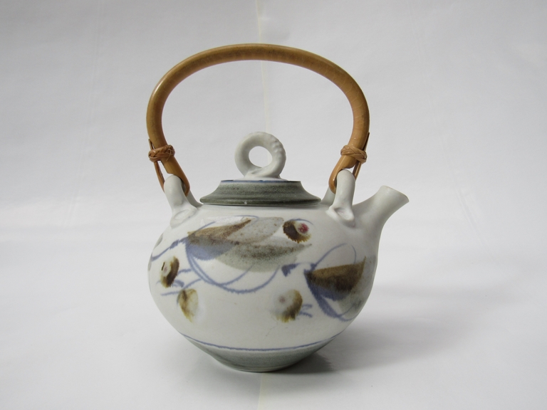 ANDREW HAGUE (b.1948) A studio porcelain teapot, white ground with painted detail.