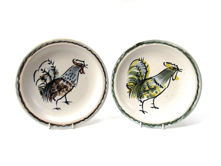 MARIANNE DE TREY (1913-2016) Two studio pottery utility range plates painted with a cockerel.