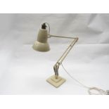 A Herbert Terry anglepoise desk lamp in cream