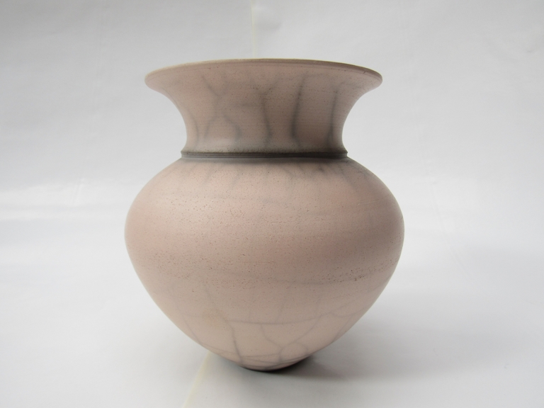 JO FIRTH (XX) A studio pottery raku fired flared vase. Incised mark. 16.