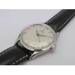 OMEGA: an automatic gent's steel wristwatch with silvered dial, Arabic 12,3,6, 9 and centre seconds,