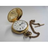 An early 20th Century 18ct gold hunter pocket watch with single-button chronograph and quarter