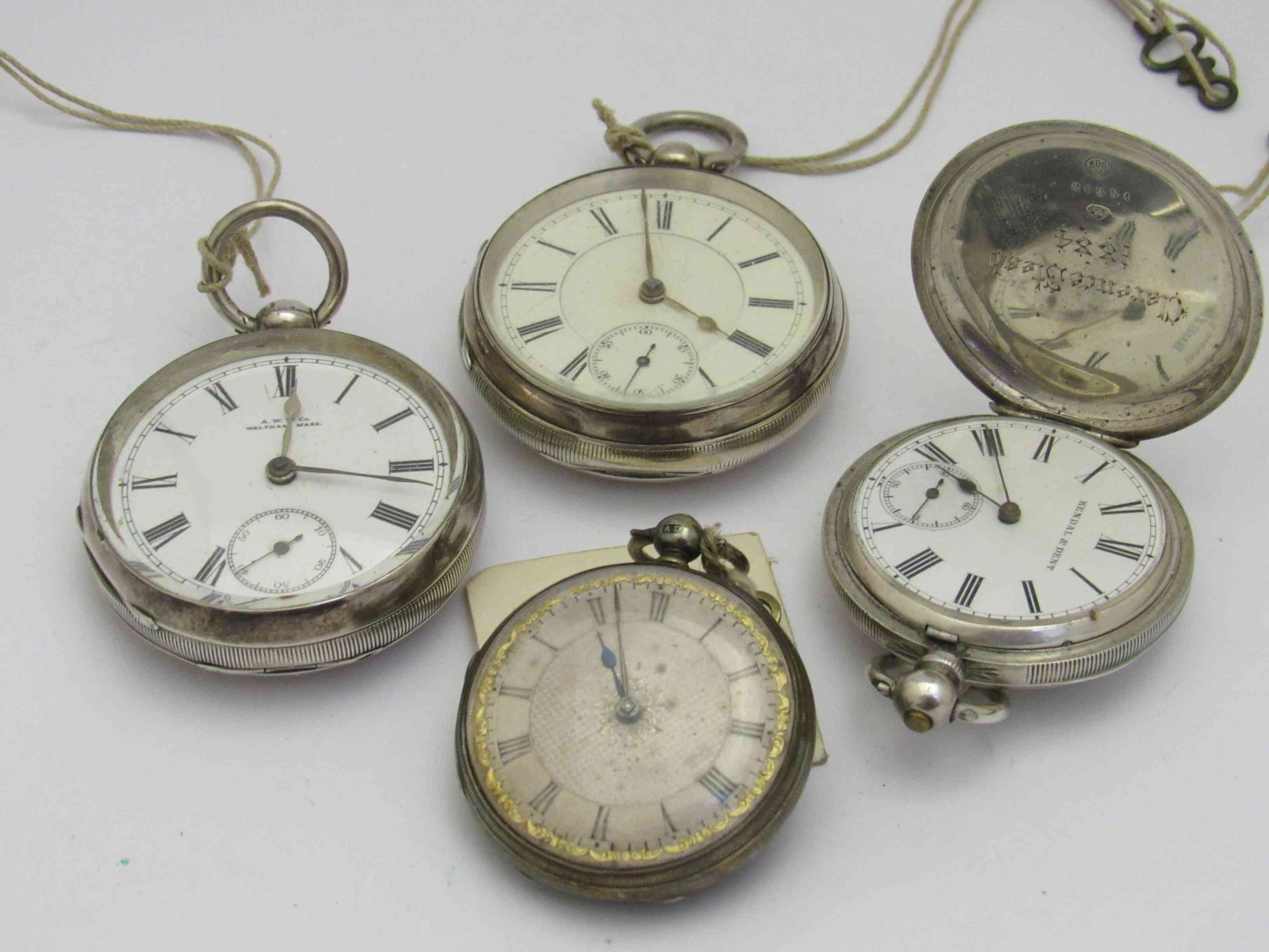 Four assorted silver pocket watches including fusee