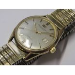 INTERNATIONAL WATCH CO: a gent's 9ct gold cased automatic wristwatch with silvered dial,
