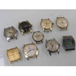 A collection of vintage wristwatches and movements including Omega