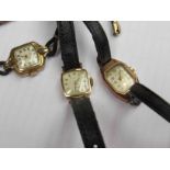 Two gold cased ladies wristwatches and another