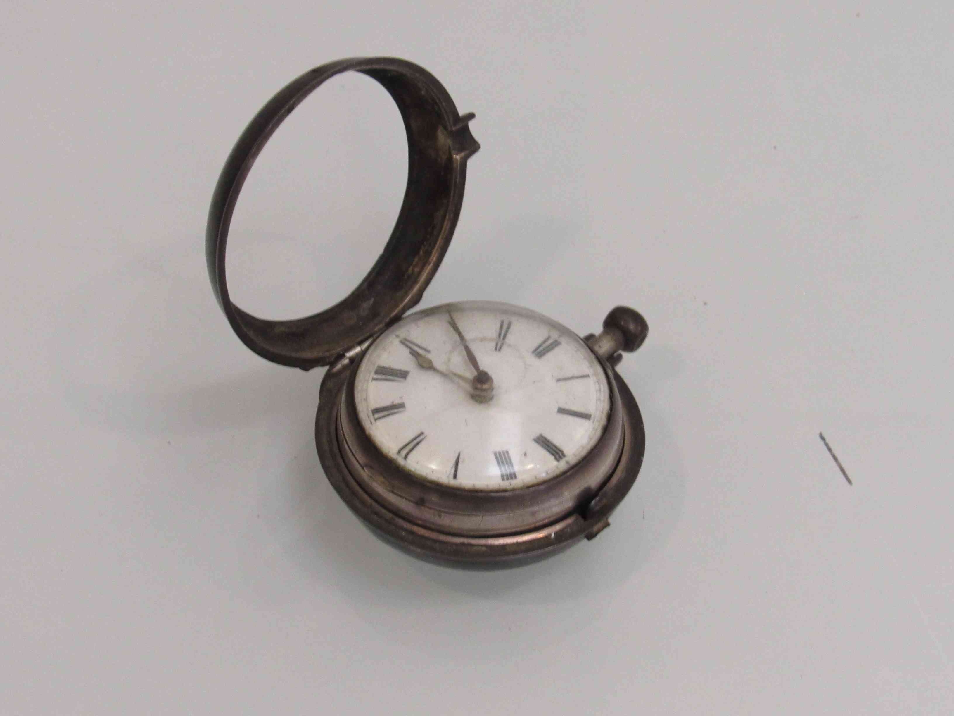 A late 18th Century silver pair case pocket watch with Roman enamelled dial,