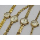 Four assorted gold ladies watches,