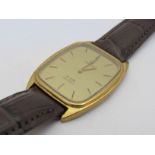 OMEGA: a De Ville quartz gent's gold plated and steel wristwatch with gilded dial,