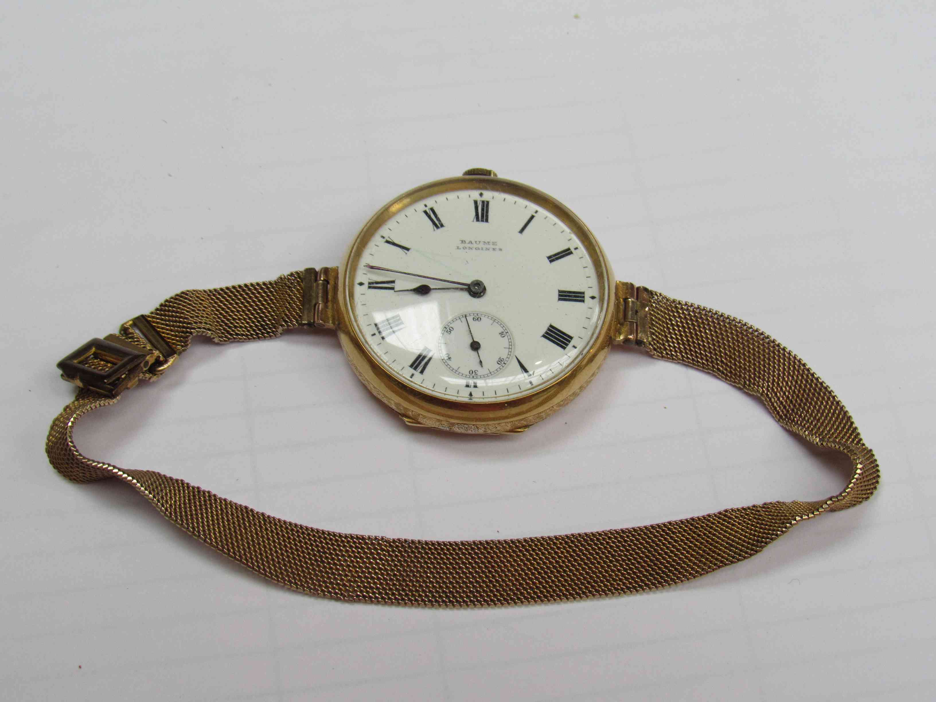 A Baume Longines 18K fob watch with Roman enamelled dial, converted to a wristwatch,