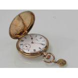 A Waltham USA 9ct gold full hunter pocket watch with Roman enamelled dial and subsidiary seconds,