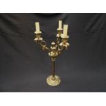 A Victorian ornate gilt metal three branch candelabrum