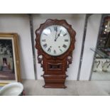 A 19th century drop dial clock with painted enamel face, Roman numeral dial,