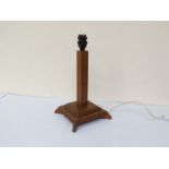 An Art Deco oak table lamp