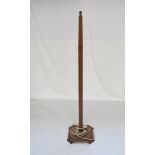 An early 20th Century Art Deco oak standard lamp, fluted column,