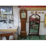 A George III oak longcase clock, painted arched Roman dial signed Feltham, Swaffham,