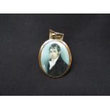 A 19th Century oval bust length portrait miniature paintied on ivory of a gentleman;