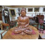 A 20th Century large carved wood Buddha,