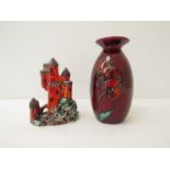 An Anita Harris vase with floral detail, 21cm high and a model of a castle,