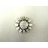 Aksel Holmsen - A Nowegian sterling and white enamel brooch in the form of a daisy.