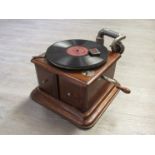 A 1920's oak wind-up gramophone