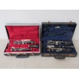 Two Boosey & Hawkes clarinets, one missing mouthpiece,