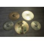 Five assorted cymbals including hi-hat and Zildjian