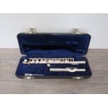 An Elkhart Armstrong silver plated piccolo,