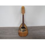 An early 20th Century round back mandolin,