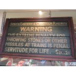 A wooden South Eastern & Chatham Railway WARNING THE EXTREME PENALTY FOR THROWING STONES OR OTHER