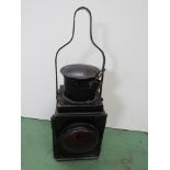 A black painted railway tail lamp