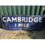 A large two section enamel sign CAMBRIDGE 1 MILE WITH ARROW POINTING TO THE LEFT AND RIGHT